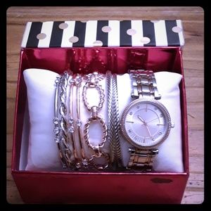 8 piece watch and bracelet set.